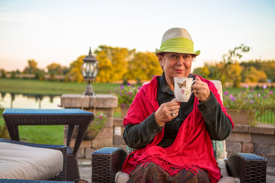 Tea Time to Stay Warm, Senior Lady with her Hot Tea
