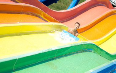 child  having fun in aqua park
