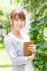 young asian woman in the park