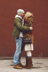 portrait of young sensual couple in autumn wather.