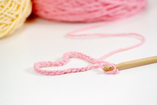 wooden crochet hook with heart shape thread