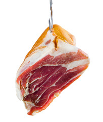 Jamon. Meat is hanging on hook. Isolated