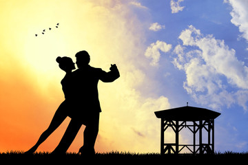 couple dancing silhouette at sunset