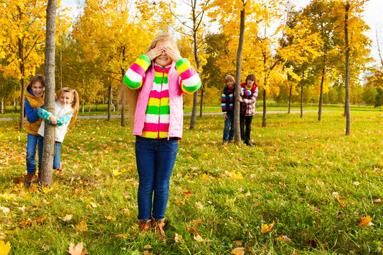 Girl Play Hide And Seek With Friends