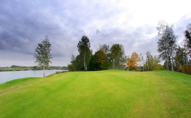 Fototapeta na wymiar Golf course landscape and green