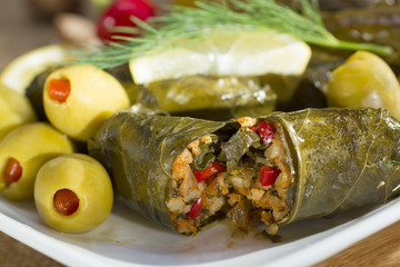 Grape leaves stuffed with rice.