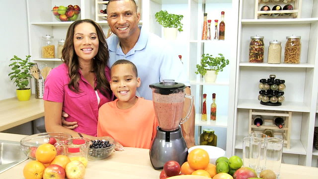 Healthy African American Family Blender Organic Fruit Drink