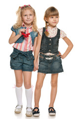 Little girls with red berries