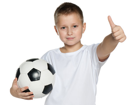 Smiling boy with soccer ball