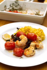 Prawns with risotto rice and tomatoes