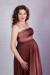 Portrait of a beautiful pregnant young woman