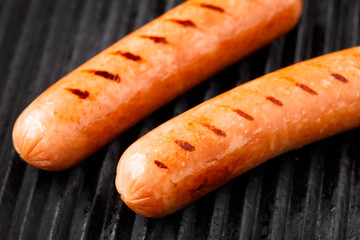 Sausages on a grill