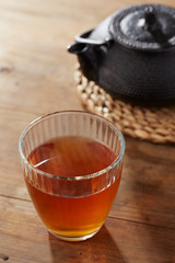 Brown tea on glass cup