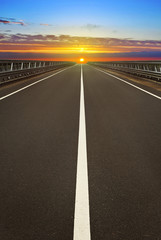 Fototapeta premium sunset over the road