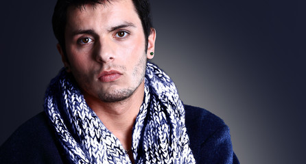 Elegant young handsome man. Studio fashion portrait.