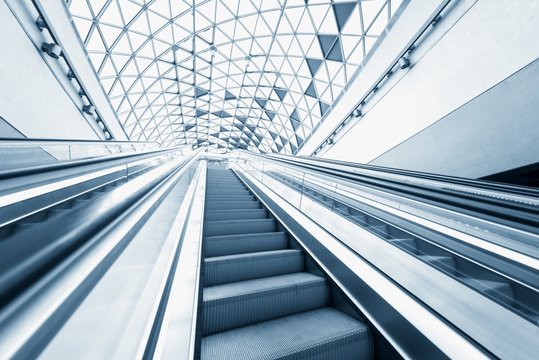 Moving escalator in the business center
