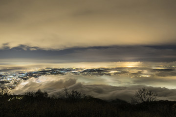 Foggy night over Varese city, Lombardy