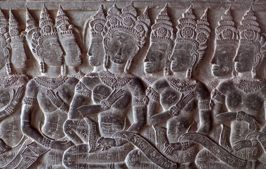 Ancient bas-relief at the facade of Angkor Wat