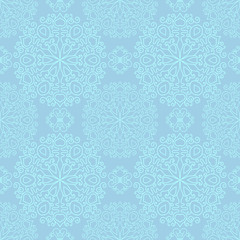 Naklejka na ściany i meble Blue seamless pattern with delicate snowflakes