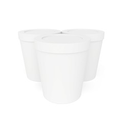 Standing next to the white paper cups