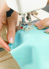 Image of seamstress working   on sewing machine