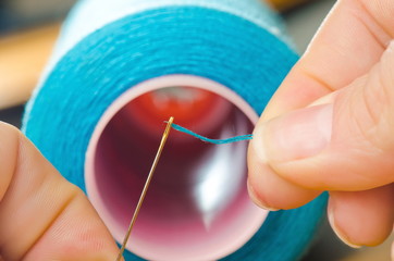 to put the sewing thread into needle