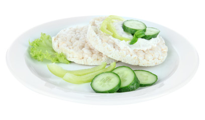 Tasty crispbreads with vegetables, isolated on white