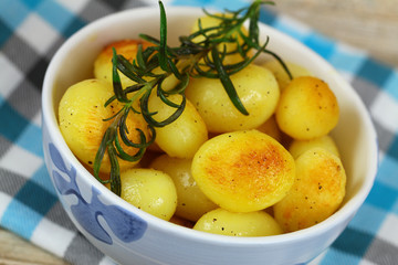 Roasted baby potatoes with rosemary, close up