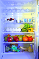 Refrigerator full of food © Africa Studio