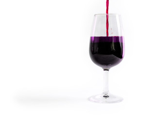 closeup of wine glass and spilled alcohol