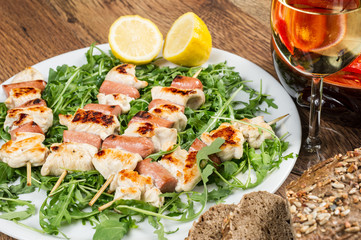 grilled chicken on bamboo skewers