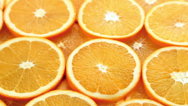 Fresh and juicy sliced oranges motion background