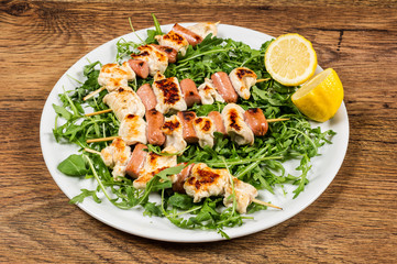 grilled chicken on bamboo skewers
