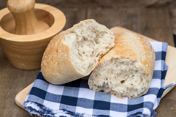 Loaf of sourdough bread in rustic kitchend setting