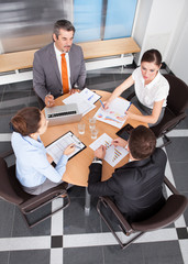 Businesspeople Working In Office