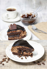 Piece of chocolate cake on wooden table