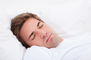Fototapeta na wymiar Young Man Sleeping