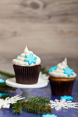 Christmas theme. Cupcake with snowflake shaped sugar