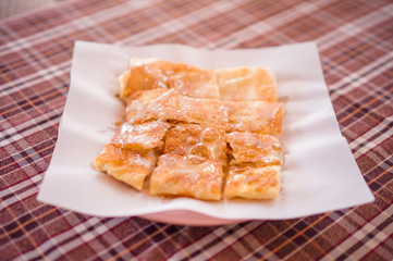 Pancakes with nuts and sugar caramel on top