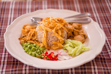 Spicy rice with chicken, eggs, pepper salad