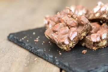 Rustic background with rocky road dessert squares