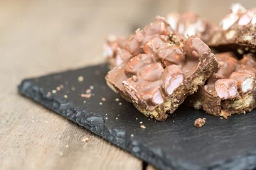Foto op Canvas Rustic background with rocky road dessert squares © veneratio