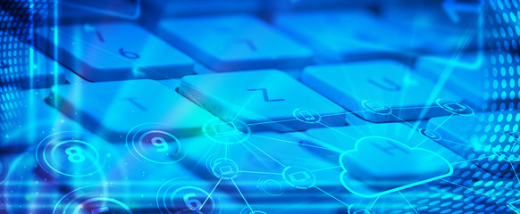 Keyboard with glowing cloud technology icons