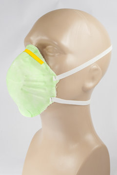 plastic mannequin wearing Protective Dust Mask