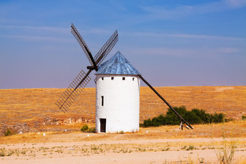 Windmill in field