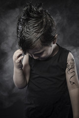 Dragon tattoo, rebellious child, funny guy with slicked back hai