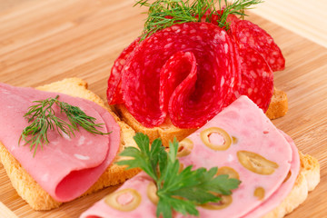 Sandwiches with salami and mortadella