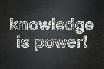 Education concept: Knowledge Is power! on chalkboard background