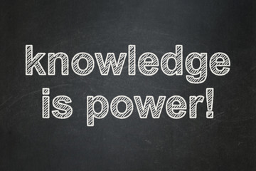 Obraz premium Education concept: Knowledge Is power! on chalkboard background