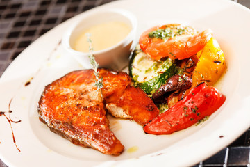 salmon steak with vegetables